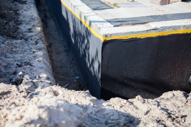 Professional Waterproofing technician working in London, OH